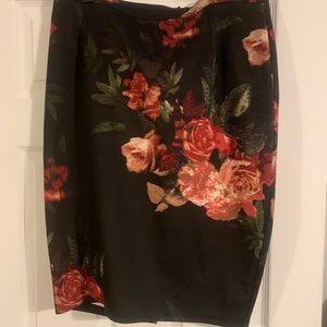 Beautiful Satin Skirt that can be dressed up or down. Skirt falls to the knee